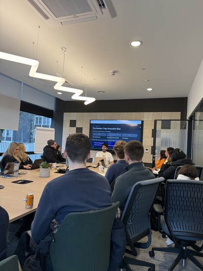 Jake presenting at a boardroom